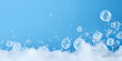 Detergent foam bubble on blue background
