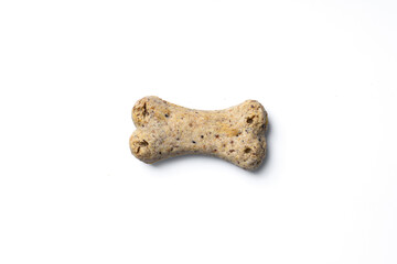 Top view of group of crunchy bone shaped dog biscuit set isolated on white background