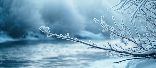 Poster - Icicles on a branch on a background of a mountain river Icicles in winter Icicles frost scene Place for text or advertising. with copy space image. Place for adding text or design