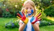 Child's hands covered in brightly colored paint. Perfect for art projects and creative activities	
