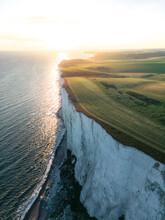 Aerial Drone View Of The Seven Sisters Cliffs National Park During Sunset In The Eastbourne, England, United Kingdom.