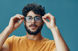 © SHOTPRIME STUDIO - Portrait young fashionable person face attractive men background looking expression cool guy adult confident