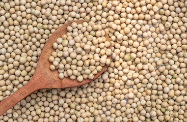 Wall Mural - Top View of Dry Pea with a Wooden Ladle with Copy Space