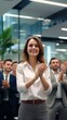 © Adobe Contributor - A group of business professionals applaud during a meeting
