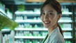 Smiling female asian pharmacist in drugstore store
