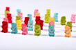 © Peter Togel - Colorful Gummy Bear Army Marching on White Background - Fun Candy Parade Concept