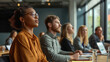 © Factory - A diverse group of professionals engrossed in a captivating presentation in a modern meeting room. Collaboration, teamwork, growth, success, innovation.