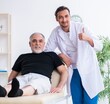 © Elnur - Old injured man visiting young doctor