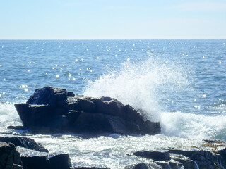 Sticker - Ocean waves meeting a rocky shore