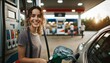 © ibreakstock - Joyful young woman with gas nozzle in overalls refueling car at gas station