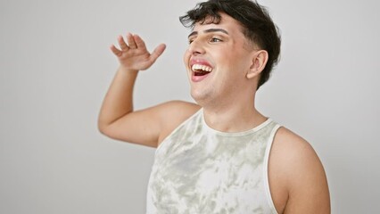 Sticker - Handsome young man, wearing a sleeveless t-shirt, stands confident and happy, looking far ahead. searching with his eyes in the distance, isolated against a vibrant white wall.