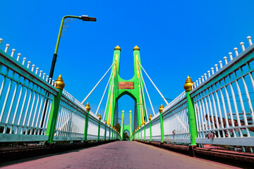 Sticker - Green suspension bridge across Nan River at Chum Saeng District