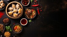 Top View Of Noodles, Gyoza Dumplings, Dim Sum, Spring Rolls, Rice, Chicken On A Black Background With A Copy Space. Chinese Cuisine, Delicious Food Of A Restaurant, Cafe, Hotel.
