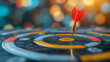 © Taskmanager - Close-up of a dart in the center of a bullseye, symbolizing success, precision, and achieving goals in a competitive environment.