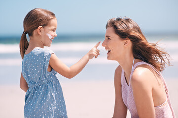 Wall Mural - Child, mother and nose with sunscreen on beach for summer protection for healthy skin, safety or weekend. Woman, daughter and happy in Florida for bonding holiday or vacation, sunshine or outdoor