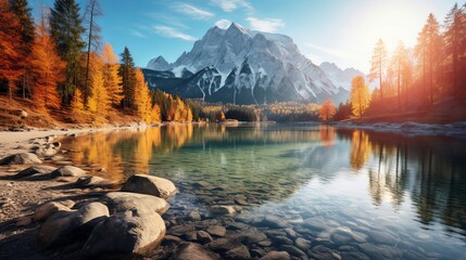  Impressive Autumn landscape during sunset.  The Fusine Lake in front of the Mongart under sunlight. Amazing sunny day on the mountain lake. concept of an ideal resting place. Creative image