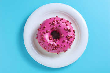 Wall Mural - Pink donut in plate