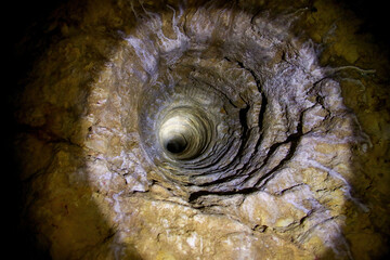 Wall Mural - Vertical shaft in the Victoria Fossil Cave in the Naracoorte Caves National Park in South Australia