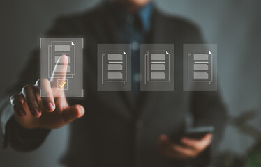 Poster - E-document management, online documentation database, paperless office concept, Businessman touching on document for online approve paperless quality assurance and ERP management concept.