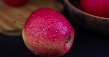 Wall Mural - red ripe apples on the table, wet crisp red apples in close-up