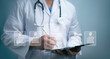 © Toowongsa - A medical worker work with  virtual Quality Certificate and Checklist document analyst target marketing planning assignment with quality management.Guarantee,ISO