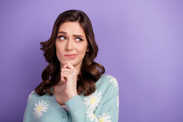 Sticker - Photo of doubtful unsure lady dressed flower print cardigan arm chin looking empty space isolated violet color background