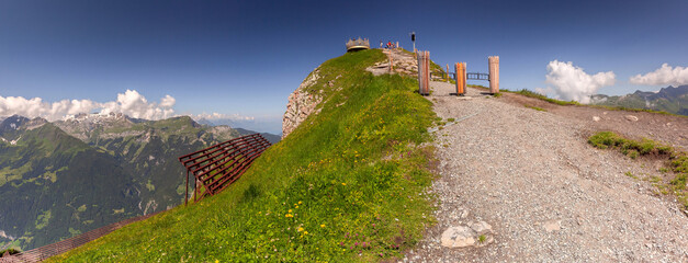 Wall Mural - Panoramic view of viewpoint on top of mountain Mannlichen in Swiss Alps, Switzerland