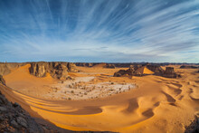 View Of Rock Formation Among The Sand Dunes In The Desert Near Ghat, Sahara Desert, Libya.