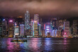 © Travel 'n' Lifestyle - View of Hong Kong skyline with financial district at night along the Victoria Harbour and Kowloon Bay, Hong Kong, China.