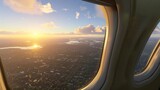Fototapeta  - A mesmerizing view from an aircraft window, showcasing a town basking under a cloudless sundown sky