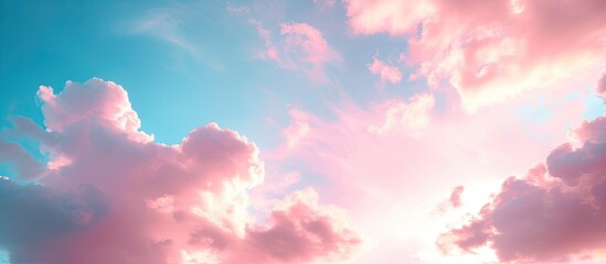 the sky is painted in soft pastel hues of pink and blue as fluffy clouds fill the horizon during sun