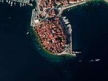 Aerial View Of Historic Korcula Island With Red Rooftops And Marina, Croatia.