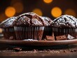 Closeup view of Delicious chocolate muffins on table. Detailed shot of chocolate muffins
