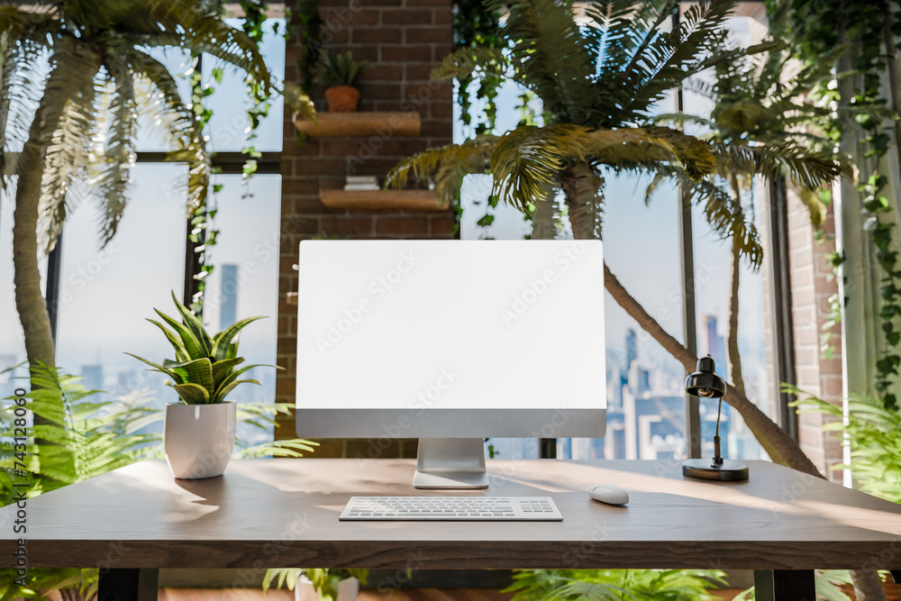 frontal view on modern pc workplace in indoor jungle environment; white ...