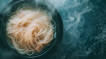Steaming Asian Noodles In A Black Bowl, Closeup