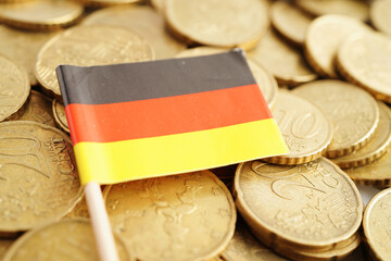 Wall Mural - Germany flag on coin and banknote money, finance trading investment business currency concept.