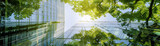 Fototapeta Tulipany - Eco-friendly glass office building against blue sky.
