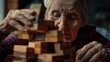 Senior Woman Engaging in Cognitive Games: Elderly Hands with Wooden Blocks
