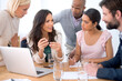 © Y.A./peopleimages.com - Team, laptop and business people listening to leader, training or brainstorming ideas together in startup. Group, computer and employees in collaboration, planning or creative designers in meeting