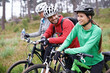 © AW/peopleimages.com - Friends, cyclist and fitness on bike with for adventure, exercise and health with bonding in Chicago. Happy, trail and mountain with hobby for mindset in nature, trip and wellness for fun.