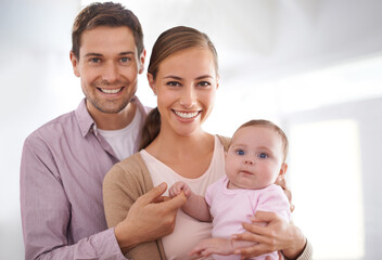 Poster - Portrait, happy family and baby with parents in home for bonding, love and smile together. Face, mother and father with infant in living room for relationship, connection and care of child in house