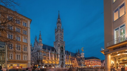 Wall Mural - Marienplazt Old Town Square with New Town Hall day to night timelapse hyperlapse. Bavaria, Germany