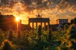 Sun setting behind Brandenburger Tor in Berlin Germany with Cannabis plants in front symbolizing legalization