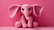 crochet pink elephant toy on pink background wall paper.