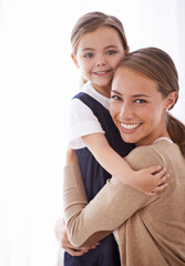 Poster - Mother, kid and hug for love and security, happy in portrait with bonding and care at family home. Safety, trust and affection with embrace to nurture and people with joy and comfort for connection