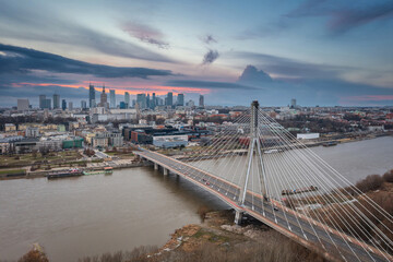 Wall Mural - Modern cityscape of Warszawa at sunset, capital city of Poland.