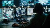 Fototapeta Panele - An operator monitors global network activity from a high-tech control room. Military operations, intelligence concept