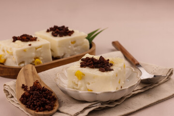 maja blanca is a filipino dessert made of coconut milk and corn, thickened with cornstarch. filipino