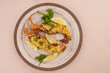Lobster Thermidor is Simmers Tender Lobster in a Creamy Parmesan Sauce, Then Broils in its Sell. 