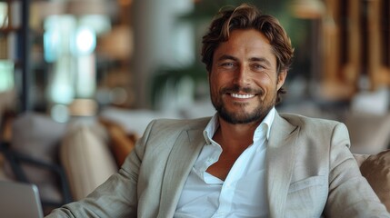 Aufkleber - On a white background, a smiling businessman sits in an office chair and works on his laptop computer